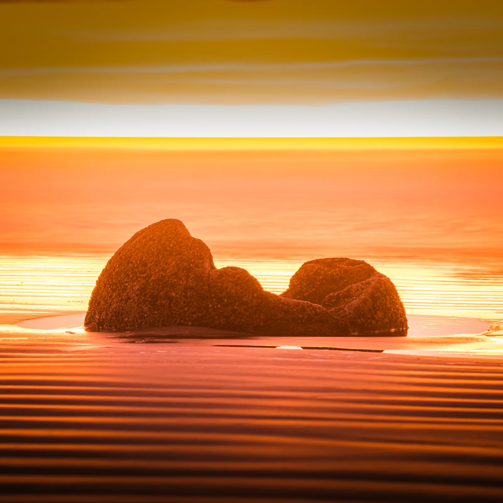 Sunrise illuminating the Moeraki Boulders